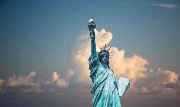 The Leadership Playbook for Moving a Company Into New York’s Competitive Market The Statue of Liberty under the blue sky